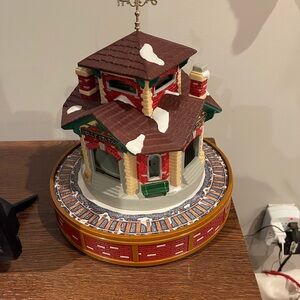 Festive Red and Brown Holiday Train Station Decor